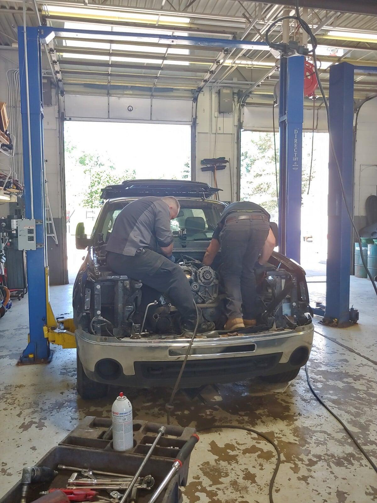Barry's auto working on an engine